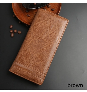 Macro view of long brown leather wallet for men featuring vintage texture and striped pattern