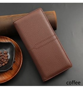 Macro shot of dark brown leather texture with decorative stitching on men's long wallet