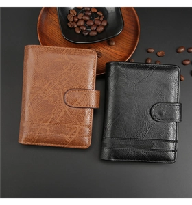 Classic tri-fold leather wallets in brown and black with vintage textured buckle closure