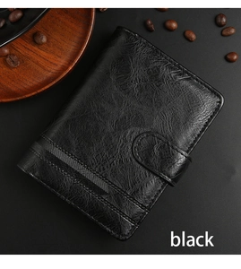 Close-up of black PU leather trifold wallet with vintage texture and strap button closure