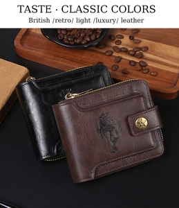 Close-up of retro leather wallets in black and brown with vintage cowboy embossing