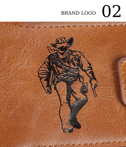 Detail of vintage brown leather wallet featuring a cowboy illustration and natural texture