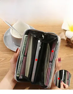 Detailed interior of beige leather wallet with multiple card slots and phone pocket