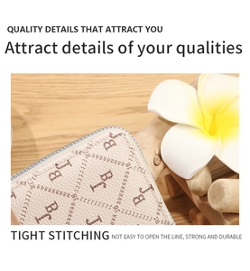 Detail of tight stitching and premium faux leather on cream long wallet for women