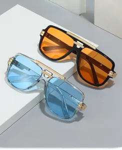 Detail of square pilot sunglasses with metal top bar and tinted lenses on white steps