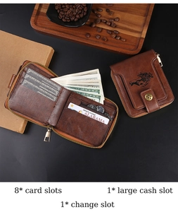 Detail view of vintage brown leather wallet with zipper and western horse embossing