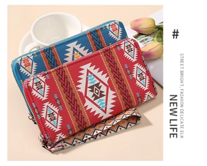 Detail of bohemian printed canvas wallets with wristlets and vintage ethnic patterns