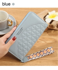 Light blue long wallet for women with geometric quilting and vintage wrist strap