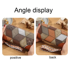 Dettaglio del portafoglio lungo con cerniera, motivo geometrico e cinturino da polso