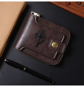 Close-up of vintage brown leather wallet with cowboy embossing and star metal snap button