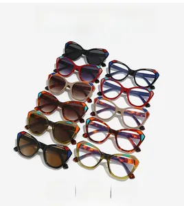 Detail of cat eye glasses frames with geometric multi-color splicing on the corners