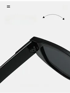 Detailed close-up of durable metal hinge on black retro sunglasses showing quality texture