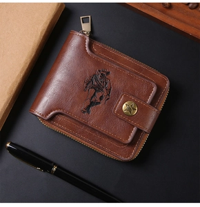 Detailed close-up of coffee brown leather wallet with cowboy embossed logo and metal stud