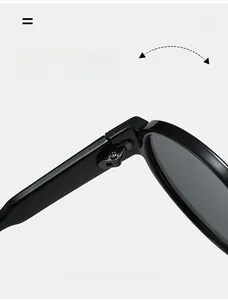 Macro detail of high-gloss sunglasses featuring a durable golden metal hinge mechanism