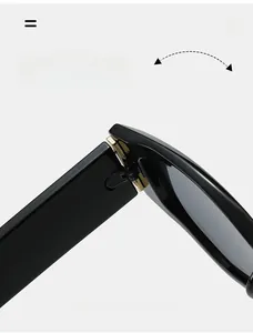 Détail de la charnière métallique durable des lunettes de soleil œil de chat noires