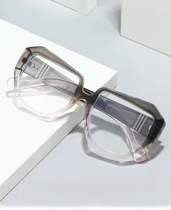 Detailed macro view of the grey-pink gradient frame showing the model number and hinge