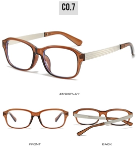 Détail de lunettes de soleil carrées marron avec branches en métal argenté et texture fine