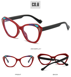 Three-way view of red cat eye sunglasses with colorful geometric temple accents