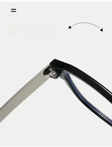 Détail macro de la charnière en métal argenté durable sur lunettes de soleil noires