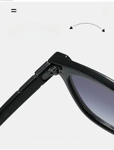 Detail of durable metal hinges on trendy square sunglasses with gradient lenses