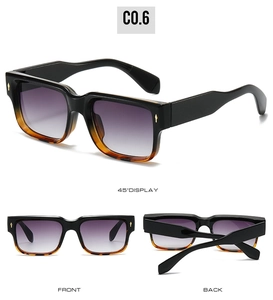 Detail view of square gradient sunglasses with gold rivets and purple tinted lenses