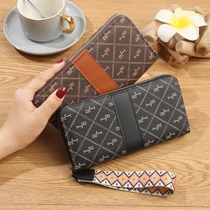 Brown and black long zip wallets with BJ monogram pattern and woven wrist strap