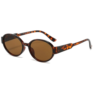 Oval leopard print sunglasses with brown lenses and golden accents on a white background