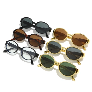 Oval retro sunglasses with gold metallic frames and tinted lenses in multiple colors