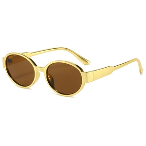 Oval PC sunglasses with gold metallic frame and brown lenses shown at a 45-degree angle