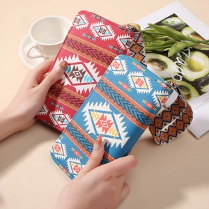 Bohemian style long zipper wallets with colorful ethnic patterns and wristlet straps