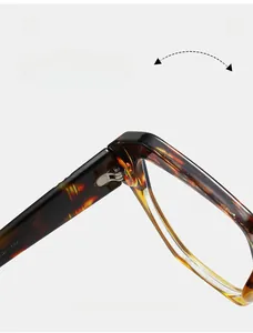Macro detail of durable silver metal hinge on tortoiseshell texture glasses frames