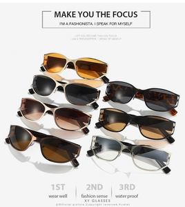 Collection of futuristic oval sunglasses in various colors on a clean white background
