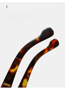 Detail of tortoiseshell patterned curved temple tips for comfortable ergonomic eyewear fit