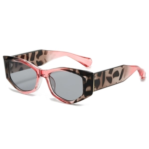 Lunettes de soleil œil de chat chic avec monture hexagonale léopard et rose pour femme
