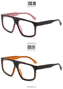 Detail view of retro square chunky frames with black exterior and translucent inner colors