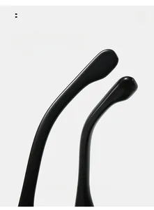 Detail view of curved sunglasses temples designed for ergonomic and comfortable daily wear