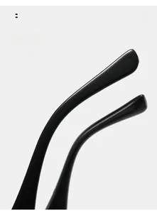 Detailed macro view of curved ergonomic black sunglasses temples for comfortable wear
