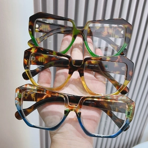 Three oversized tortoise shell glasses with blue light blocking and color gradients
