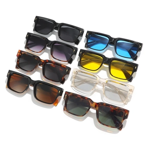 Set of vintage square sunglasses with diverse colorful lenses and gold arrow metal accents