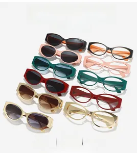 Detailed view of oval vintage sunglasses in various colors with polished metal frames