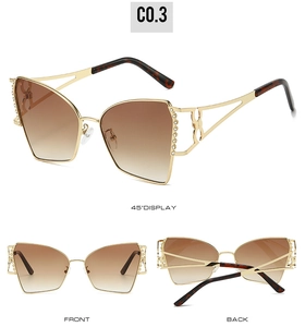 Vues détaillées de lunettes papillon avec monture dorée et verres dégradés marron
