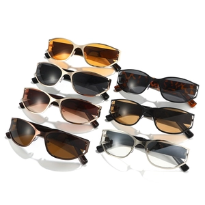 Futuristic oval sunglasses in various colors and metallic frames on white background