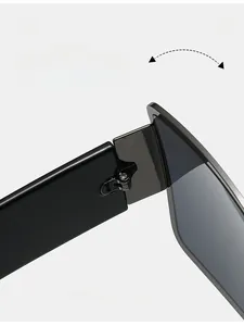 Close-up of durable metal hinge on black sunglasses with premium polished finish
