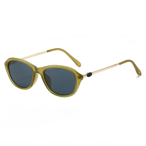 Occhiali da sole vintage gatto con montatura verde trasparente e lenti grigie da donna
