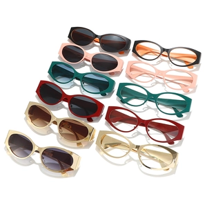 Retro oval sunglasses in various colors featuring high-gloss frames and shaded lenses