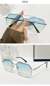 Detail of pilot metal sunglasses featuring blue-yellow gradient lenses and gold double bridge