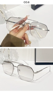 Detail view of silver metal double bridge aviator sunglasses with gradient lenses