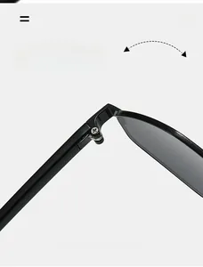 Macro detail of a durable black metal hinge on irregular polarized sunglasses