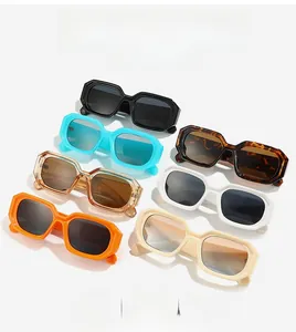 Macro view of geometric thick-framed sunglasses in seven trendy assorted colors