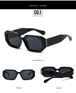 Detail view of black geometric sunglasses with thick frames and golden metal accents